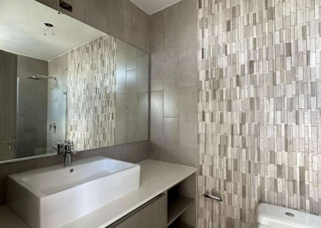 Empty bright bedroom in PH Velure with large window in Panama City