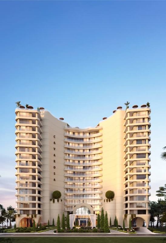 Tall modern condominium tower PH Cavarosa with balconies and rooftop garden on Causeway Panama