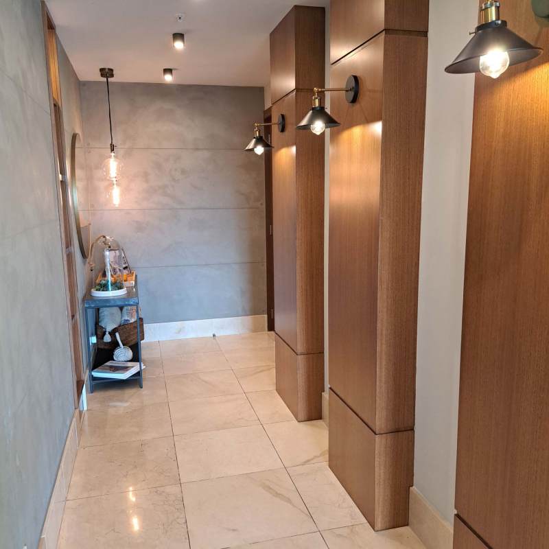 Elegant hallway wood shelves plant The Reserve Santa Maria Panama