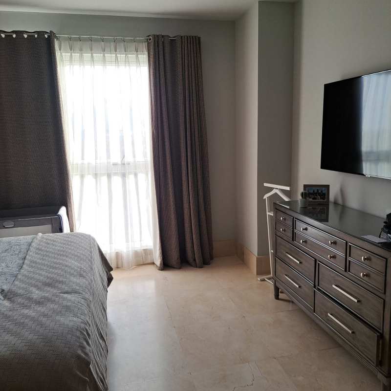 Nursery with crib and accent wall luxury condominium Santa Maria Panama