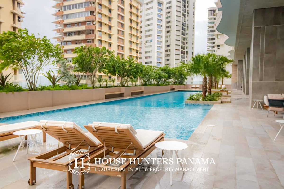 Luxury kitchen with marble island counters and stainless steel appliances in PH The Towers Panama