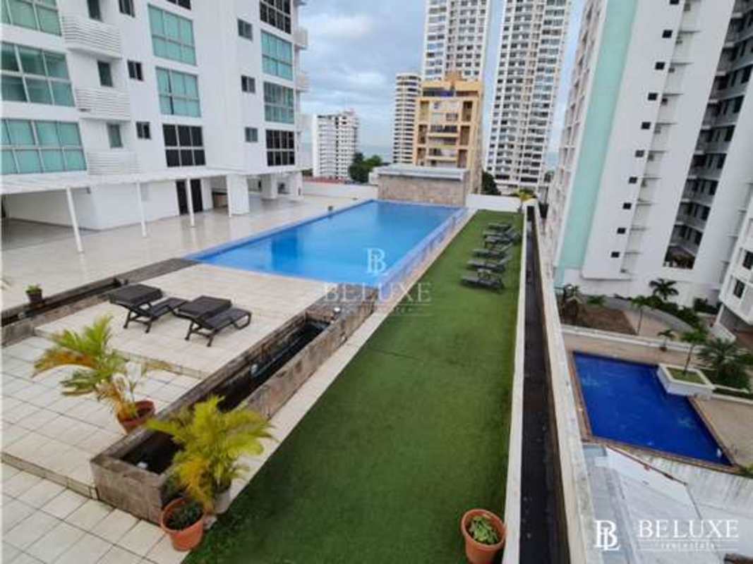 Skyline views from rooftop infinity pool with lounge area at PH Moon Tower in San Francisco Panama City