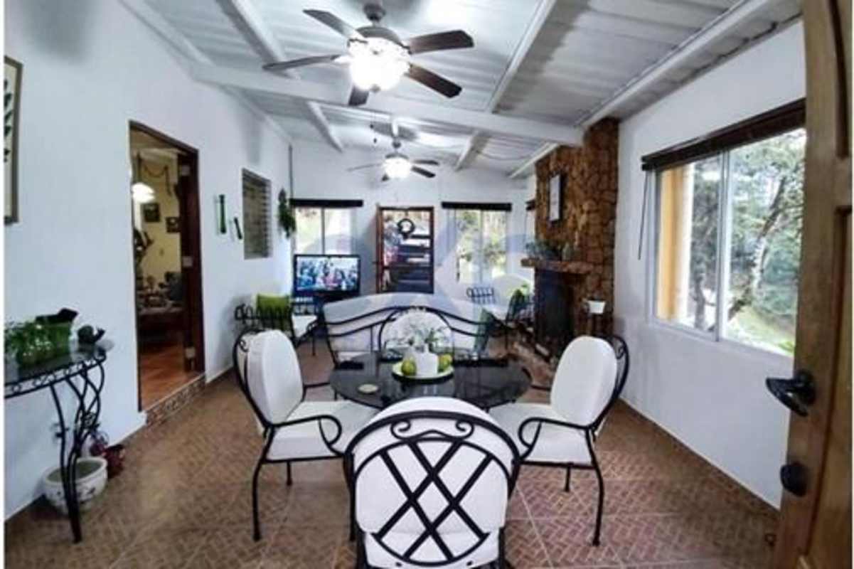Mountain cottage bedroom with pitched roof and rustic style Cerro Azul Panama real estate