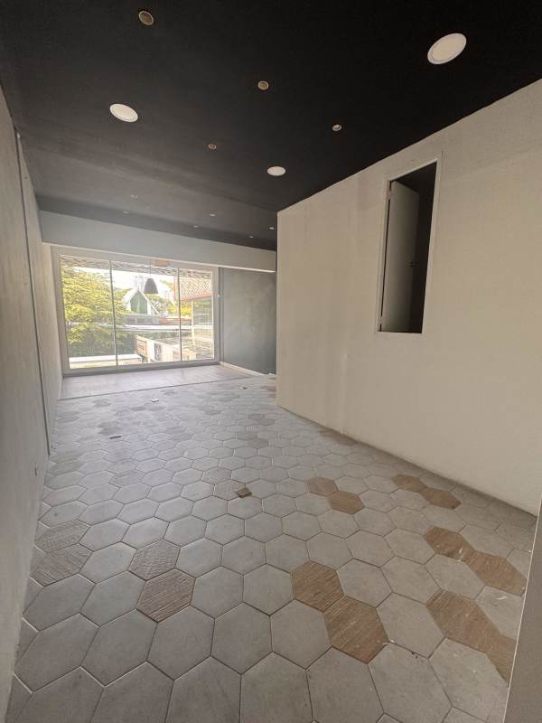 Open bright commercial space with modern tile large window black ceiling Plaza SF69 San Francisco Panama