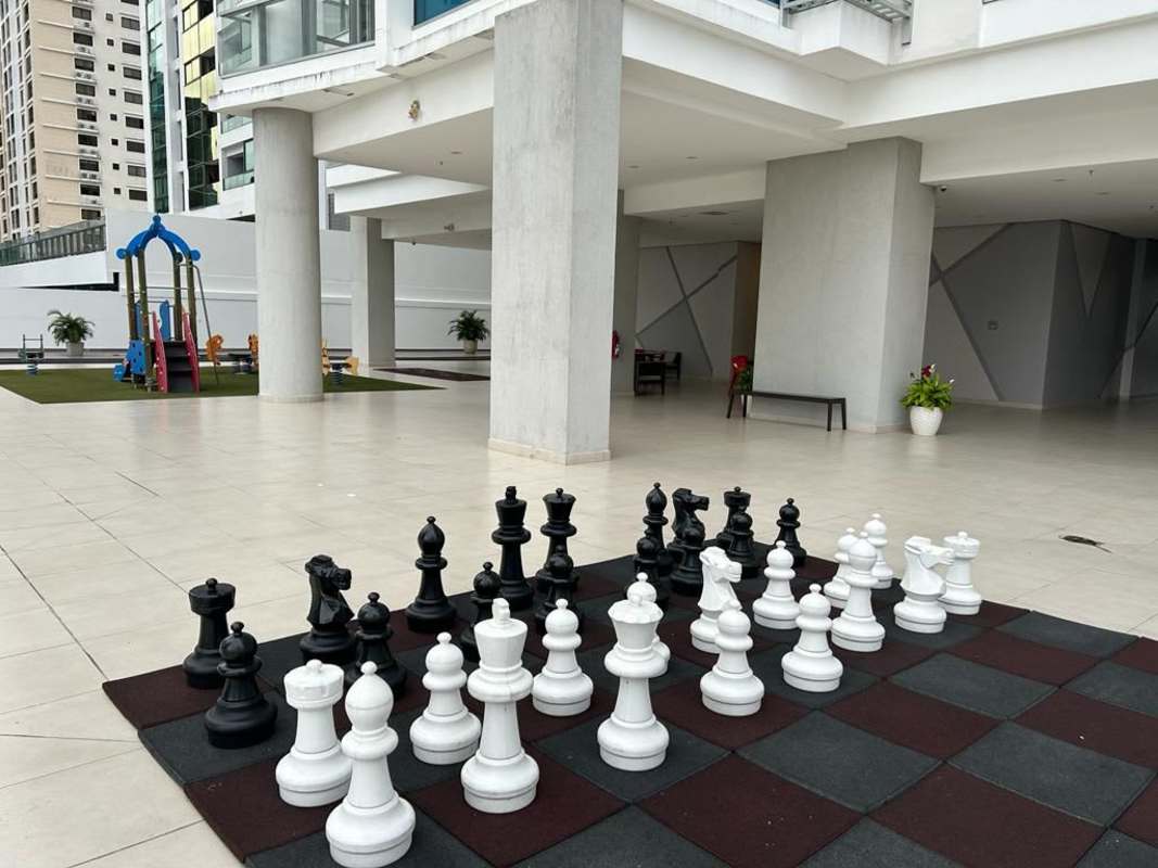 Elegant furnished bedroom with large window and park view balcony in Parkside Costa del Este