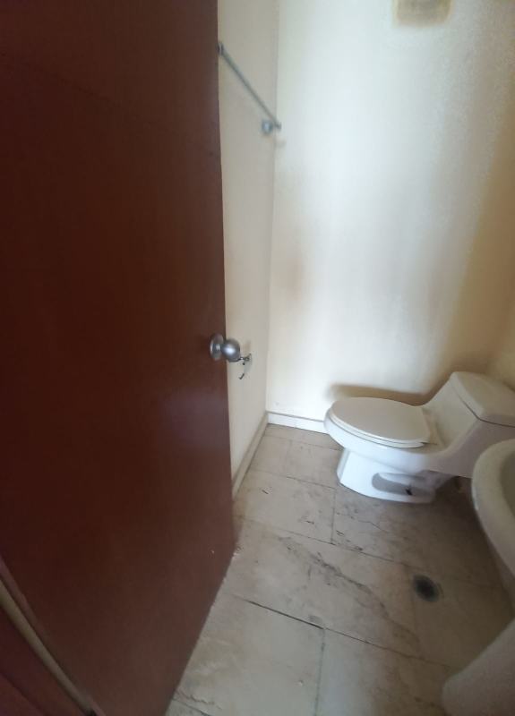 Minimalist beige bathroom with walk-in shower and tile in PH Costa Pacifica Panama