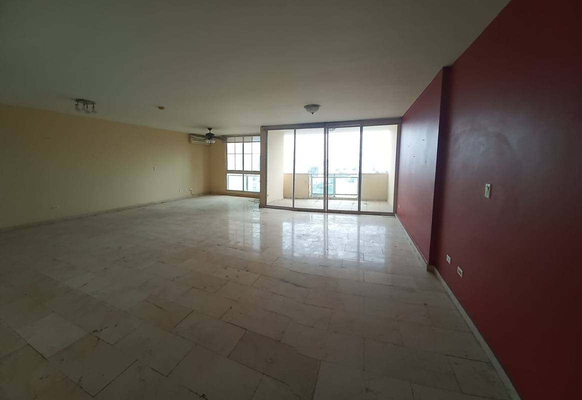 Spacious living room with marble floor, large balcony doors and accent wall in PH Costa Pacifica Panama