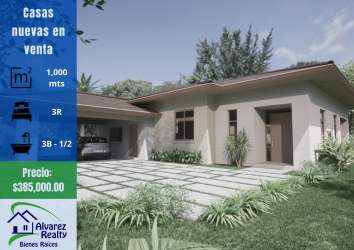 Front entrance of new home with landscaped front yard in gated community David Panama