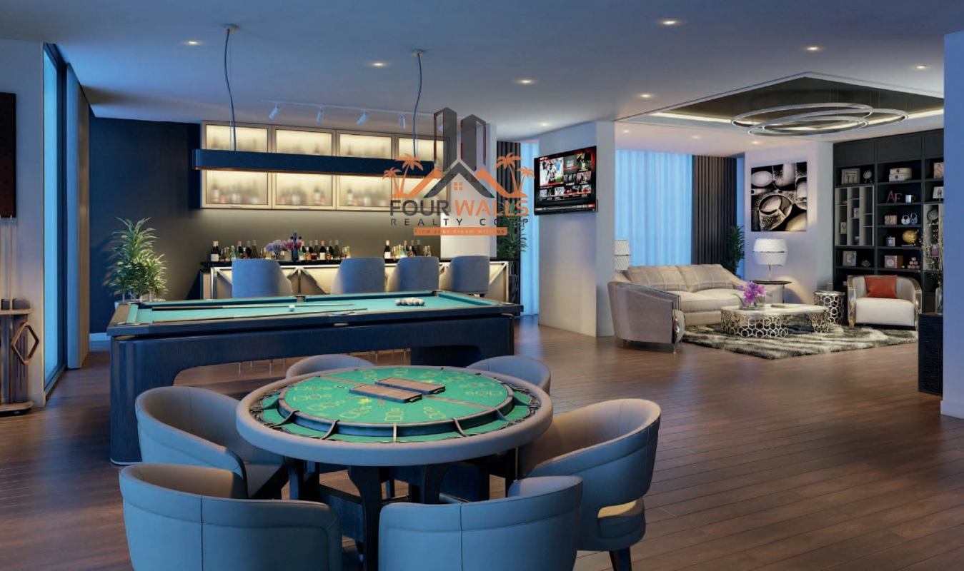 Entertainment room with pool table, poker, bar, lounge and TV at PH The Rise Park Square Vía España