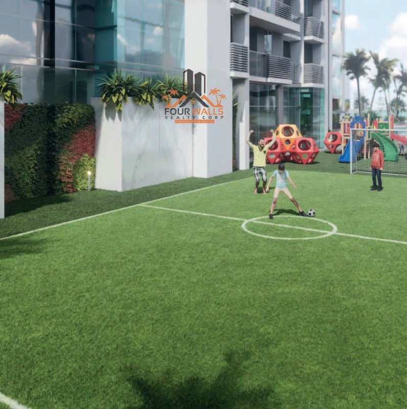 Family-friendly amenities with playground and mini soccer field at The Rise Park Square Panama City