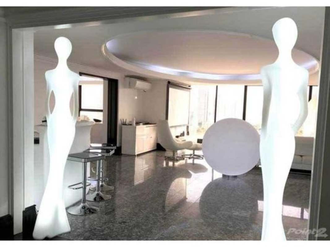 Bedroom with large windows city views luxury apartment La Cresta