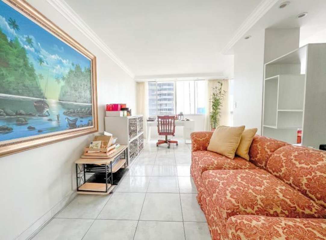 Living space with large windows, marble flooring, city view in PH Obarrio Central