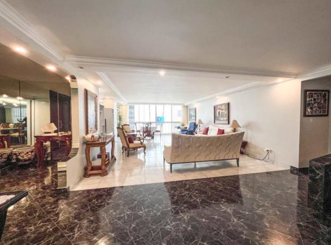 Spacious modern kitchen with granite counters, white cabinets Obarrio Panama