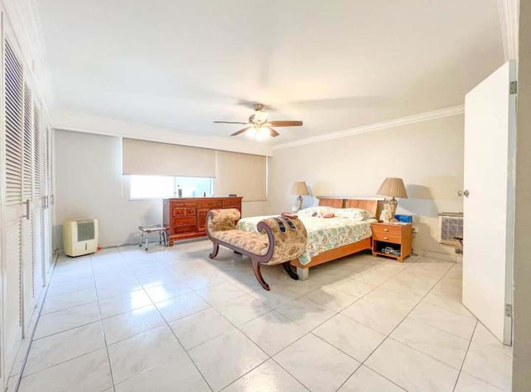 Modern bathroom glass shower enclosure granite countertop PH Obarrio Central