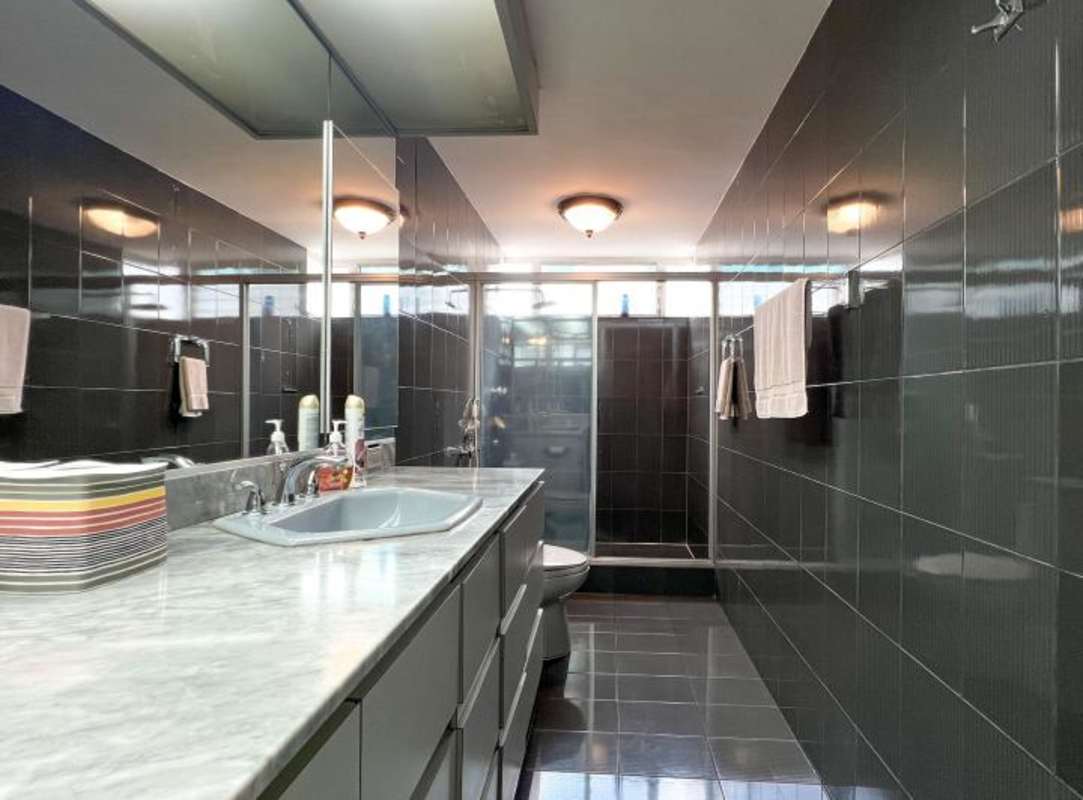 Ample bedroom with large window built-in closet ceiling fan Obarrio apartment