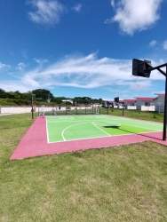 Outdoor basketball court in gated community Bosque Dorado PH Álamos Chorrera Panama