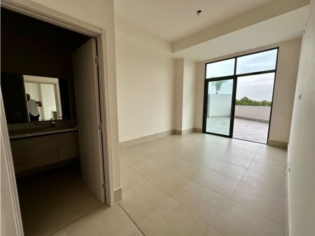 Private bedroom suite featuring balcony and ensuite bathroom at Ocean House Santa Maria