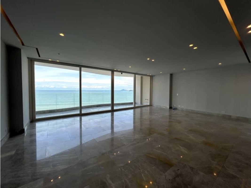 Modern living room with marble flooring and panoramic ocean view in luxury apartment PH The Towers Panama City