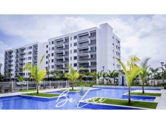 Resort-style swimming pool with gardens in PH Midrise Woodlands Panama Pacifico