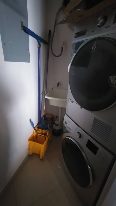 Spacious living dining area with large windows in Punta Pacifica luxury condo