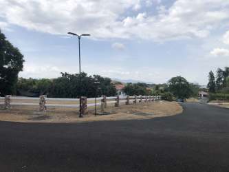 Large outdoor swimming pool with club house and gardens in Hacienda Pacífica San Carlos Panama