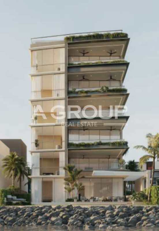 Modern waterfront residential with glass balconies, lush greenery at PH Aremar Ocean Reef Panama