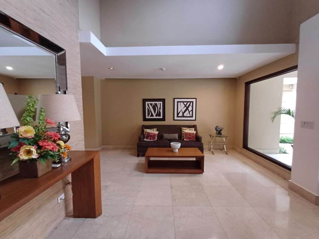 Open living area with marble porcelain floors, balcony, bright views Amador Panama