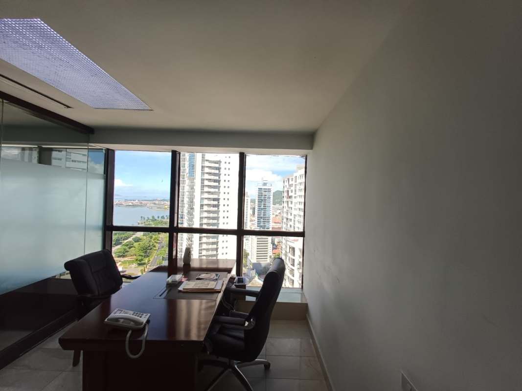 Bright office room with large windows city ocean views Avenida Balboa