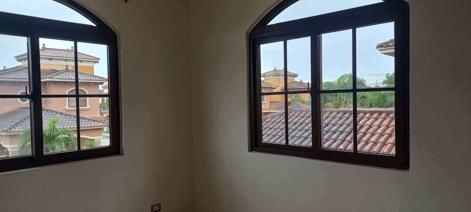 Bedroom opens onto covered balcony in house El Doral Costa Sur Panama City