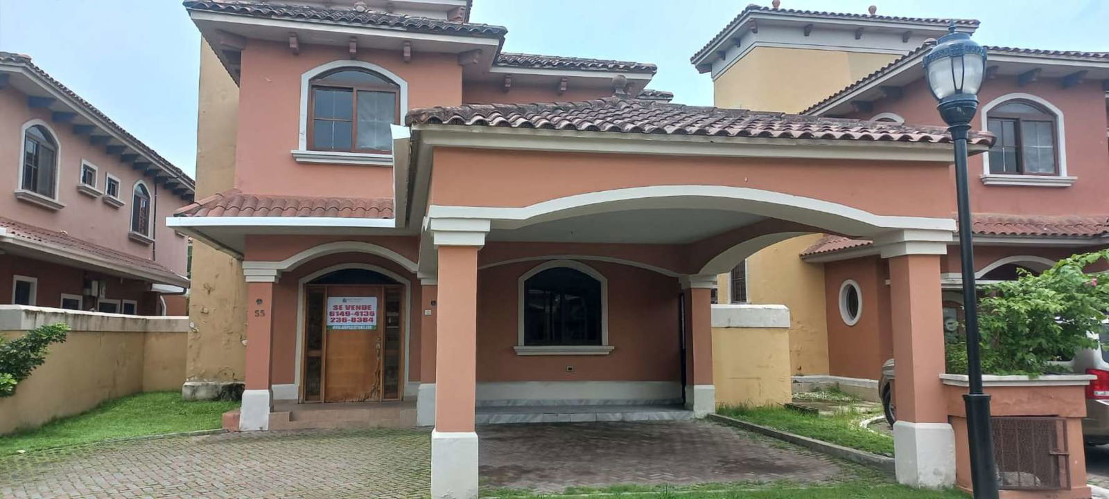 Spacious bright living room with large windows and open plan at El Doral Costa Sur Panama City