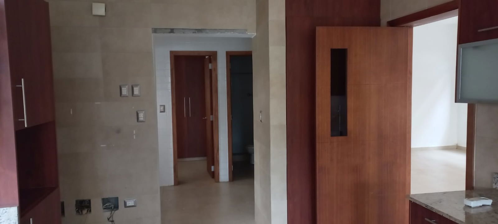 Contemporary kitchen with bay window granite countertops in house Costa Sur Panama City