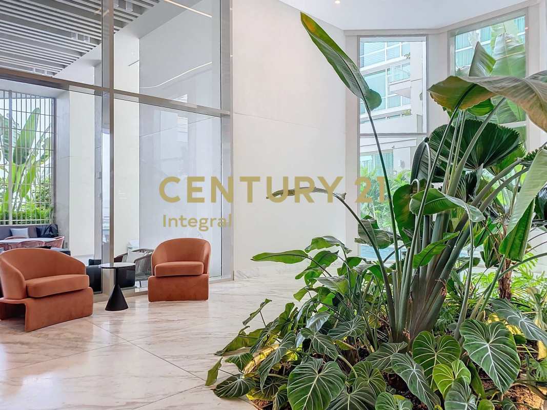 Modern lobby with sculpture, marble floors bright space PH Pacific Point Punta Pacífica Panama