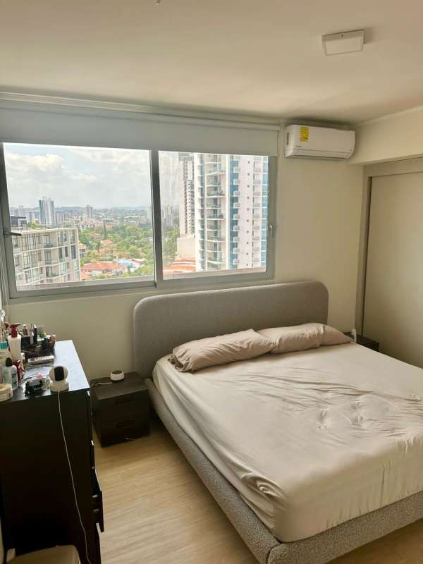 Elegant master bedroom with large windows ocean view Coco del Mar Panama City