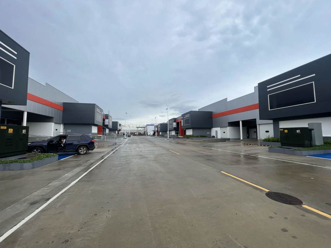 Entrance to Panama Global Logistics Free Zone with security and container truck parking