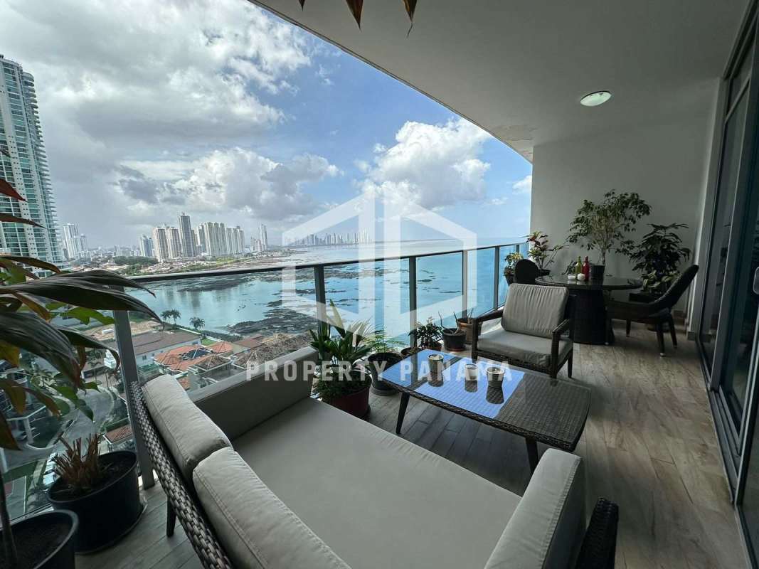 Bedroom with large windows ocean views Grand Tower Punta Pacifica luxury rental Panama