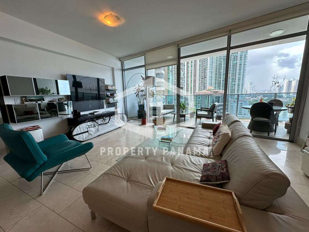 Private balcony overlooking Pacific Ocean and Panama City skyline in Grand Tower condo