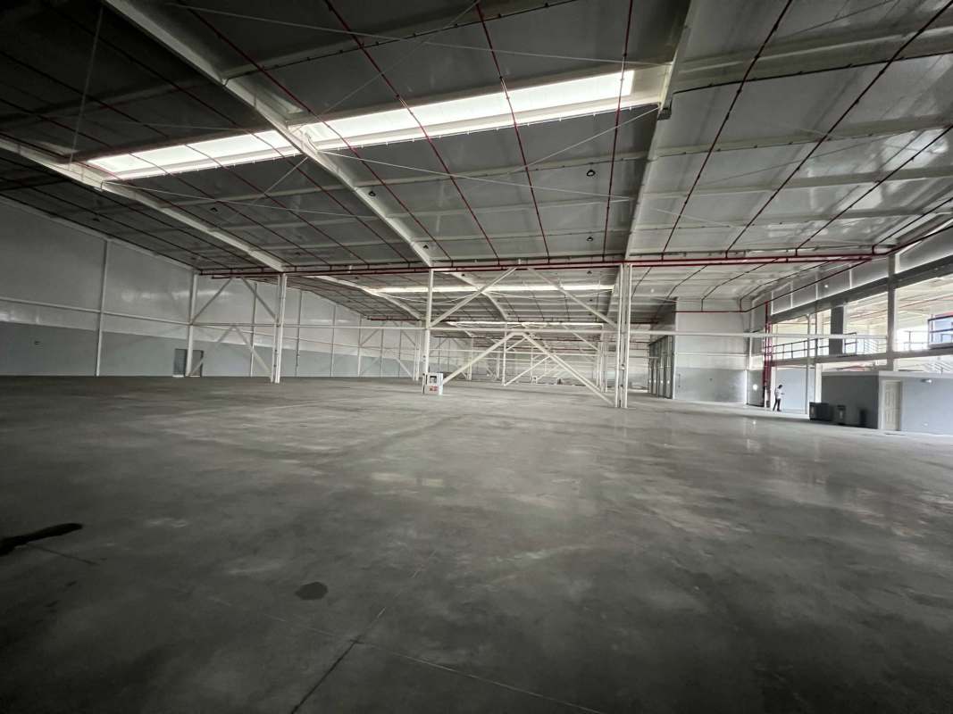 Mezzanine level with glass windows and office space inside Panama free zone warehouse