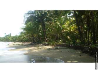 Secluded sandy Caribbean beach on development estate Playa de Coco Donoso Panama