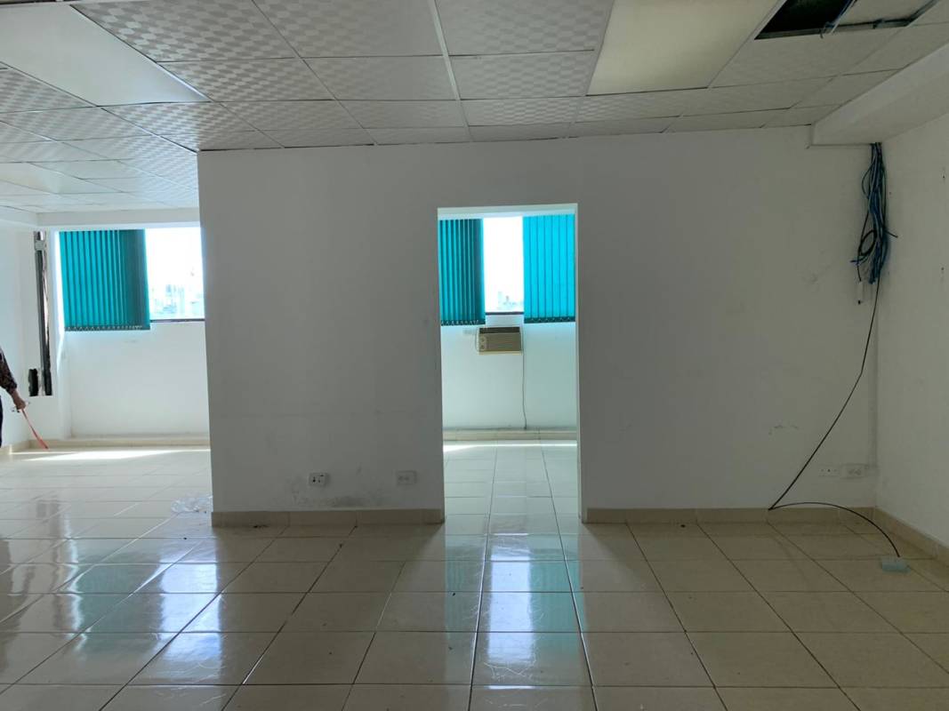 Commercial unit with tiled floor, partition walls, vertical blinds at The Century Tower