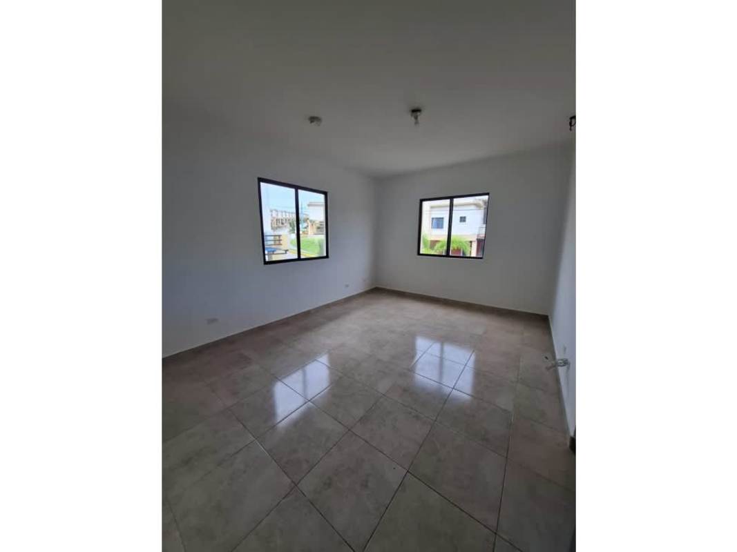 Bedroom with big windows, natural light, and balcony view in Las Cumbres community Panama