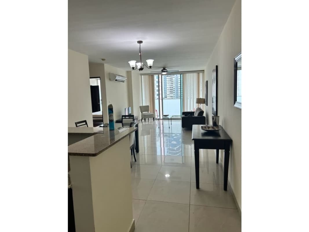 Modern living dining room with large windows and ocean views in PH Oceanaire Punta Pacífica Panama