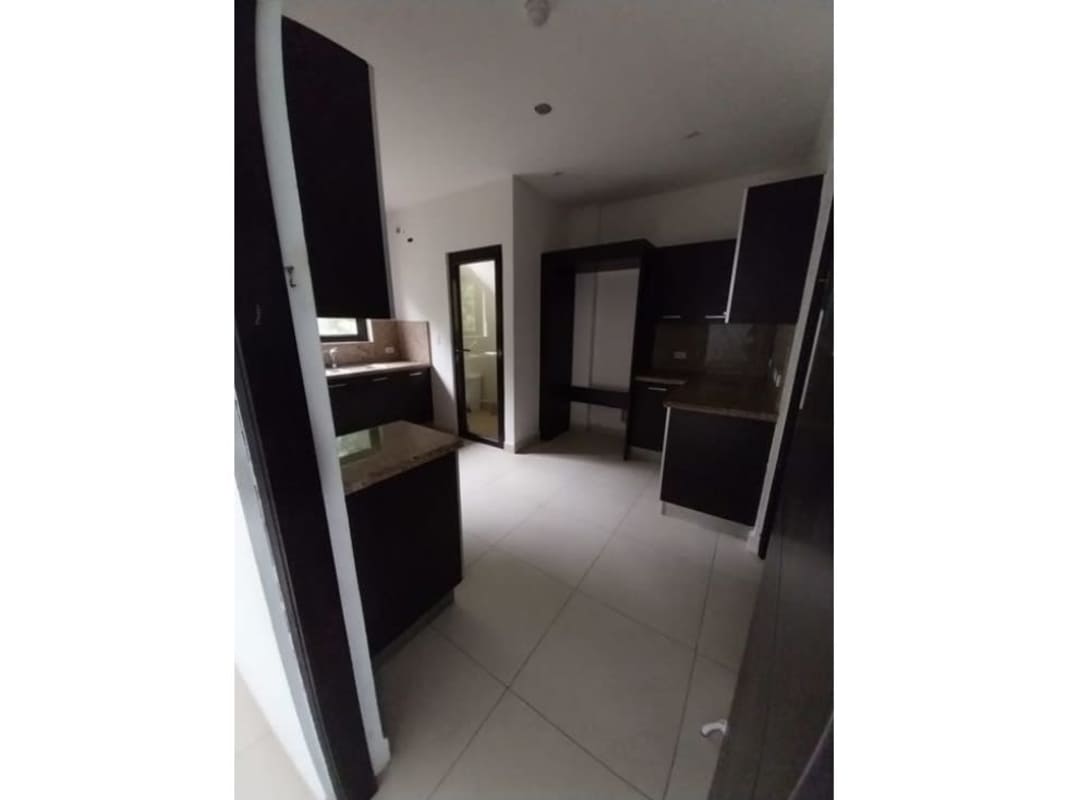 Modern laundry area connected to kitchen in Embassy Village Clayton Panama