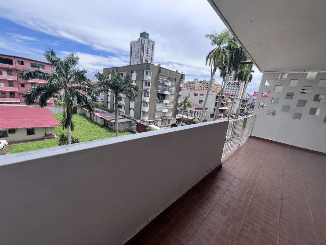 Large covered balcony overlooking the city in Bella Vista apartment for sale Panama City