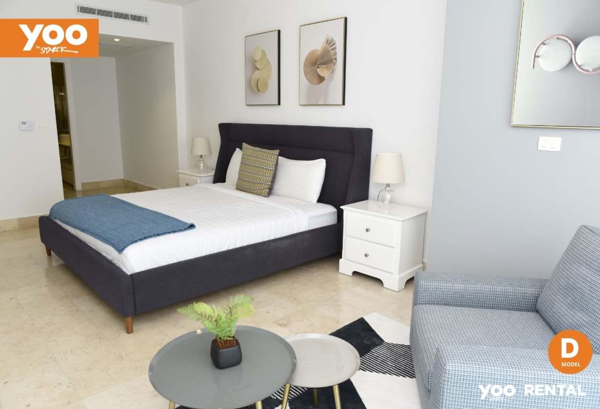 Modern bathroom with marble tiles and double vanity at PH Yoo Avenida Balboa