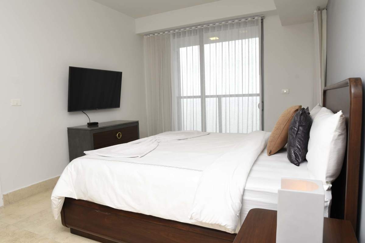 Upscale library and game lounge with pool table designer lighting PH Yoo by Starck Panama