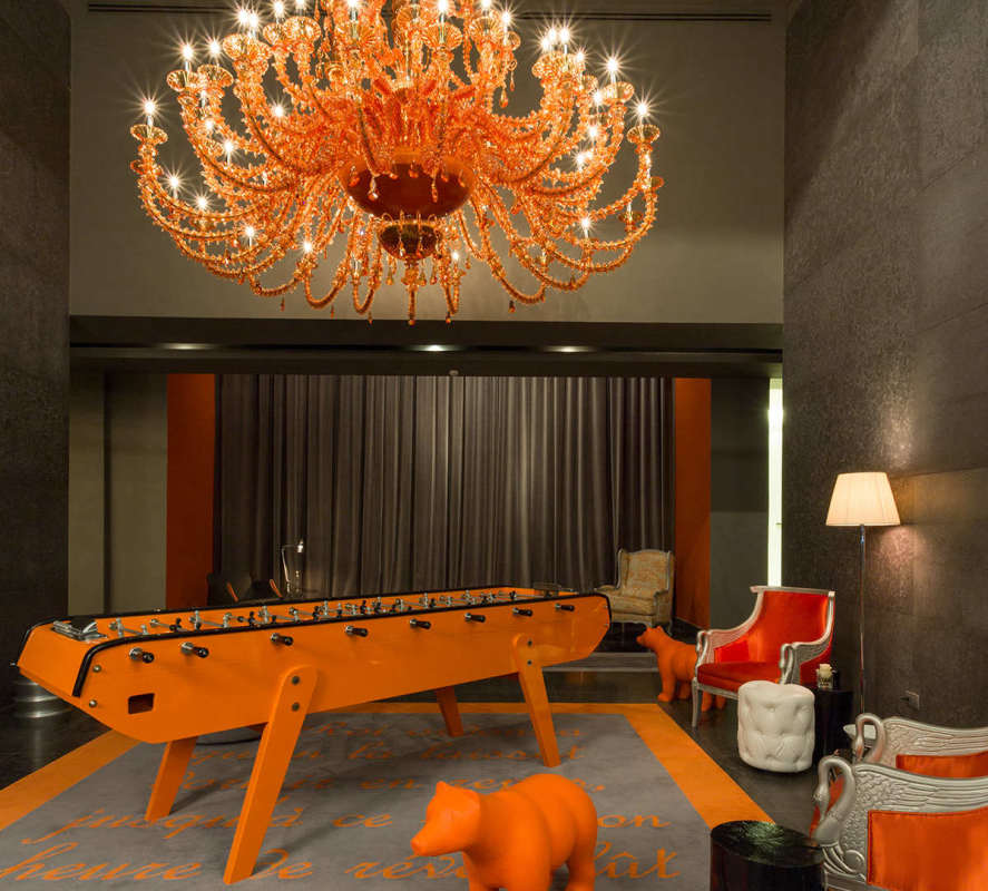 Luxury residential gym with cardio equipment and lounge PH Yoo by Starck Panama