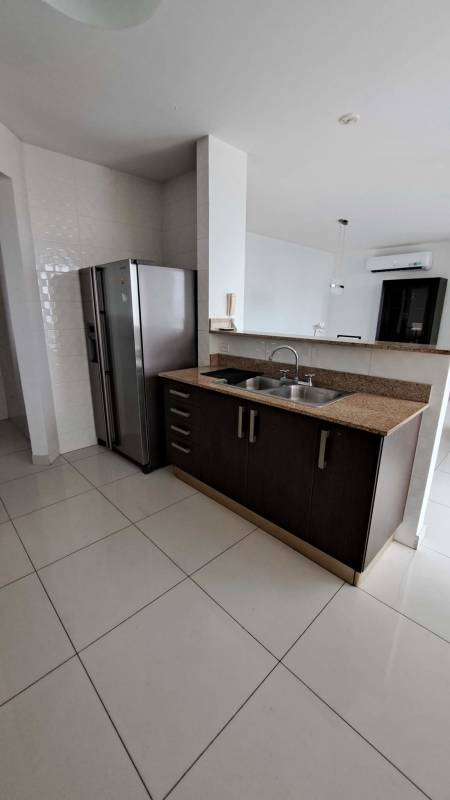 Modern open kitchen with granite countertops stainless appliances in PH Pacific Sea Panama