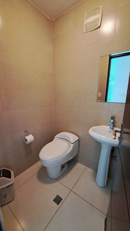 Modern bathroom with glass shower enclosure and vanity PH Pacific Sea Panama