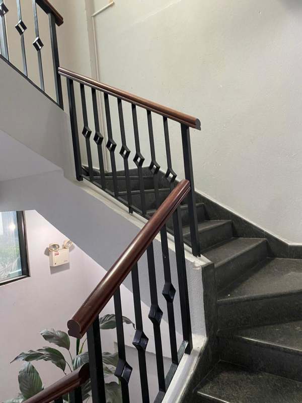 Large reception lounge with wood accents and glass doors at PH Anfra San Francisco Panama