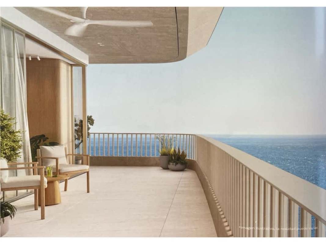 Stylish tropical outdoor lounge in Ipanema Residences overlooking Pacific Ocean coastline Panama